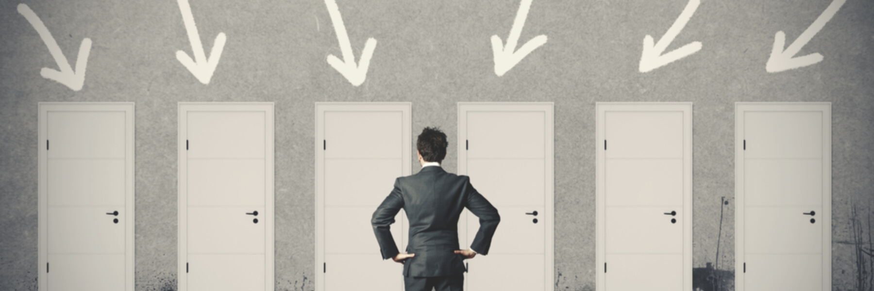 businessman standing in front of multiple doors, options for multifunction printers concept